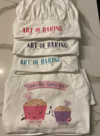 Kids baking aprons hanging and ready to use