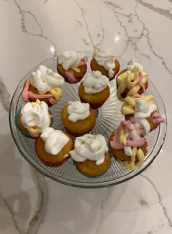 Decorated cupcakes with colorful toppings