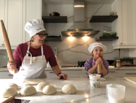 Lena baking with a child